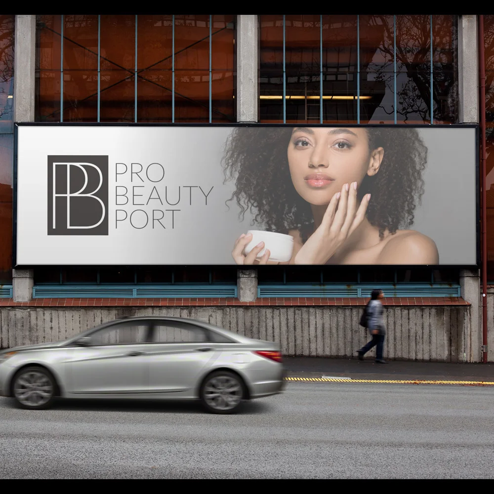 Beauty Brand Omaha Branding Services Omaha branding services billboard mockup showing a skincare brand advertisement mounted on a downtown building facade with a woman applying moisturizer, alongside passing traffic and a pedestrian.