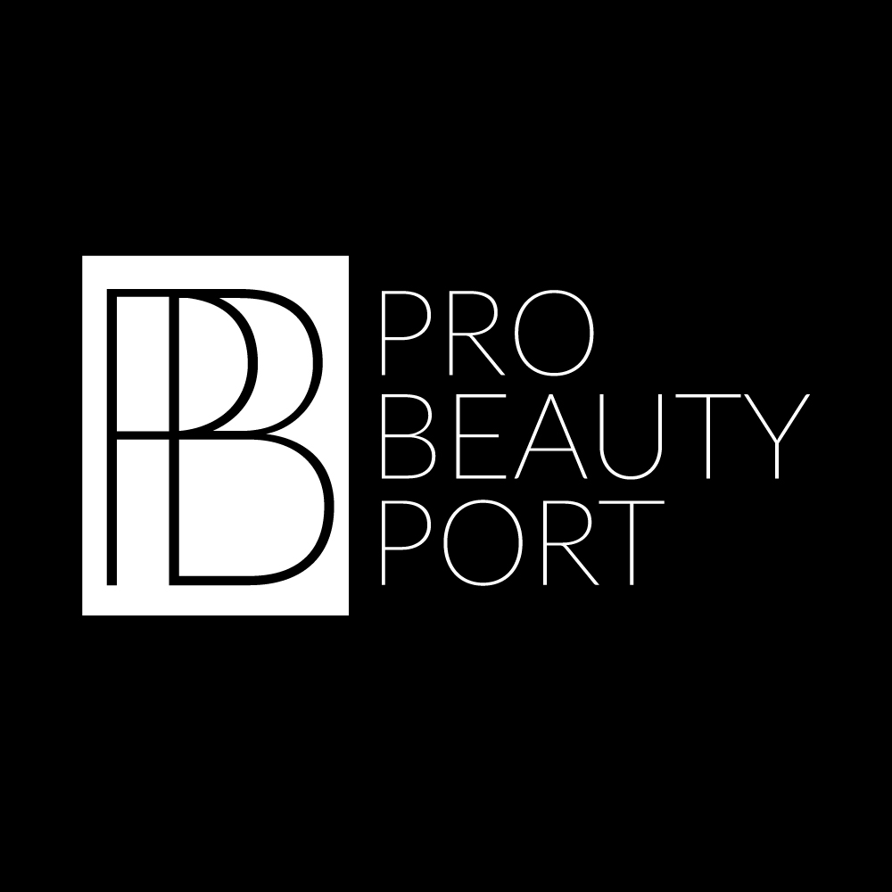 Omaha Logo Designer for Hire An inverted logo lockup on a solid black field pairs a white rectangular badge containing a slim dark monogram with thin white uppercase lettering stacked to the right, an alternate mark from an Omaha logo designer.