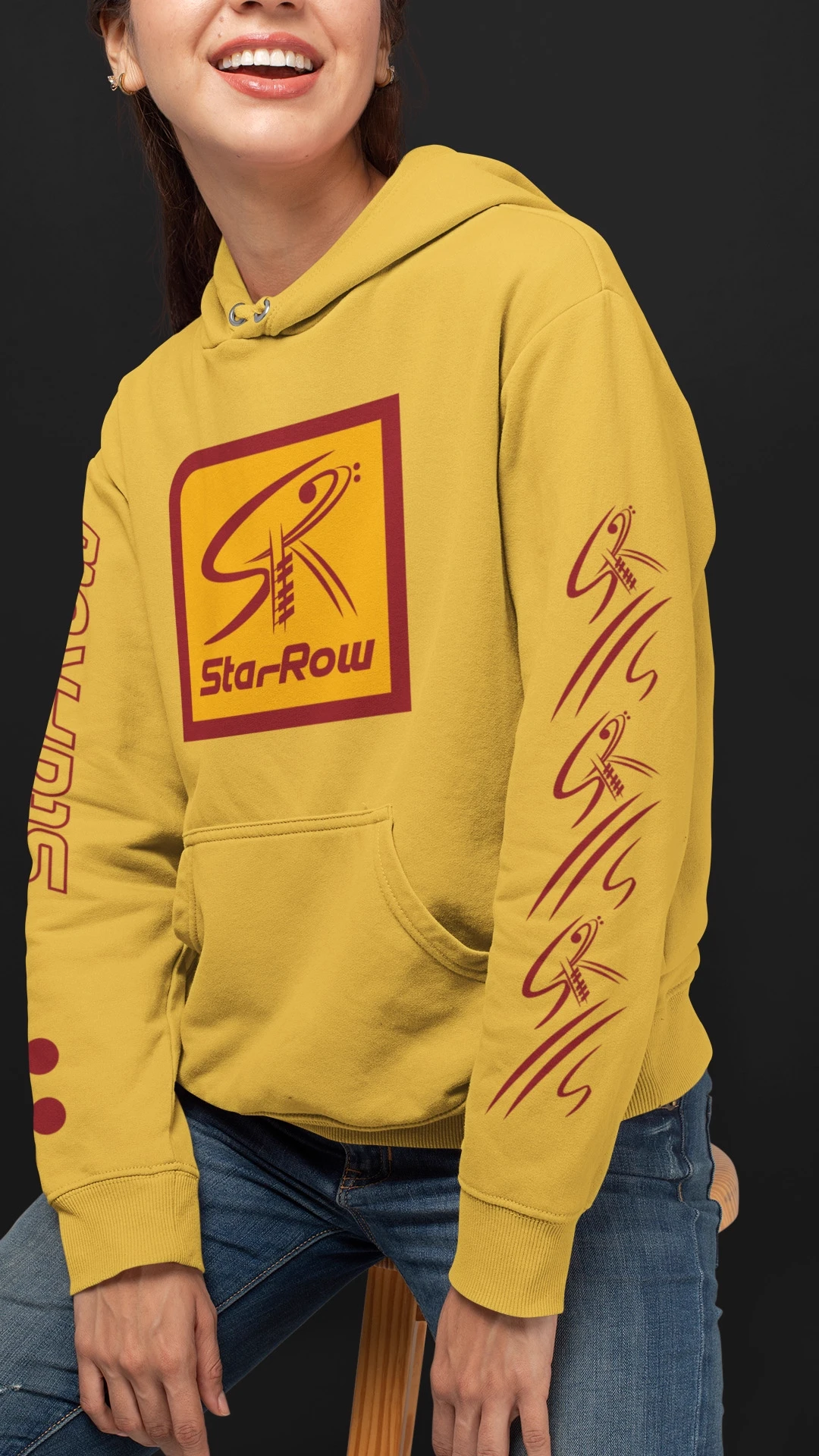 podcast-branding-starrow-merch-hoodie-design Woman wearing a StarRow podcast hoodie with the logo on the chest and a repeated icon on the sleeve