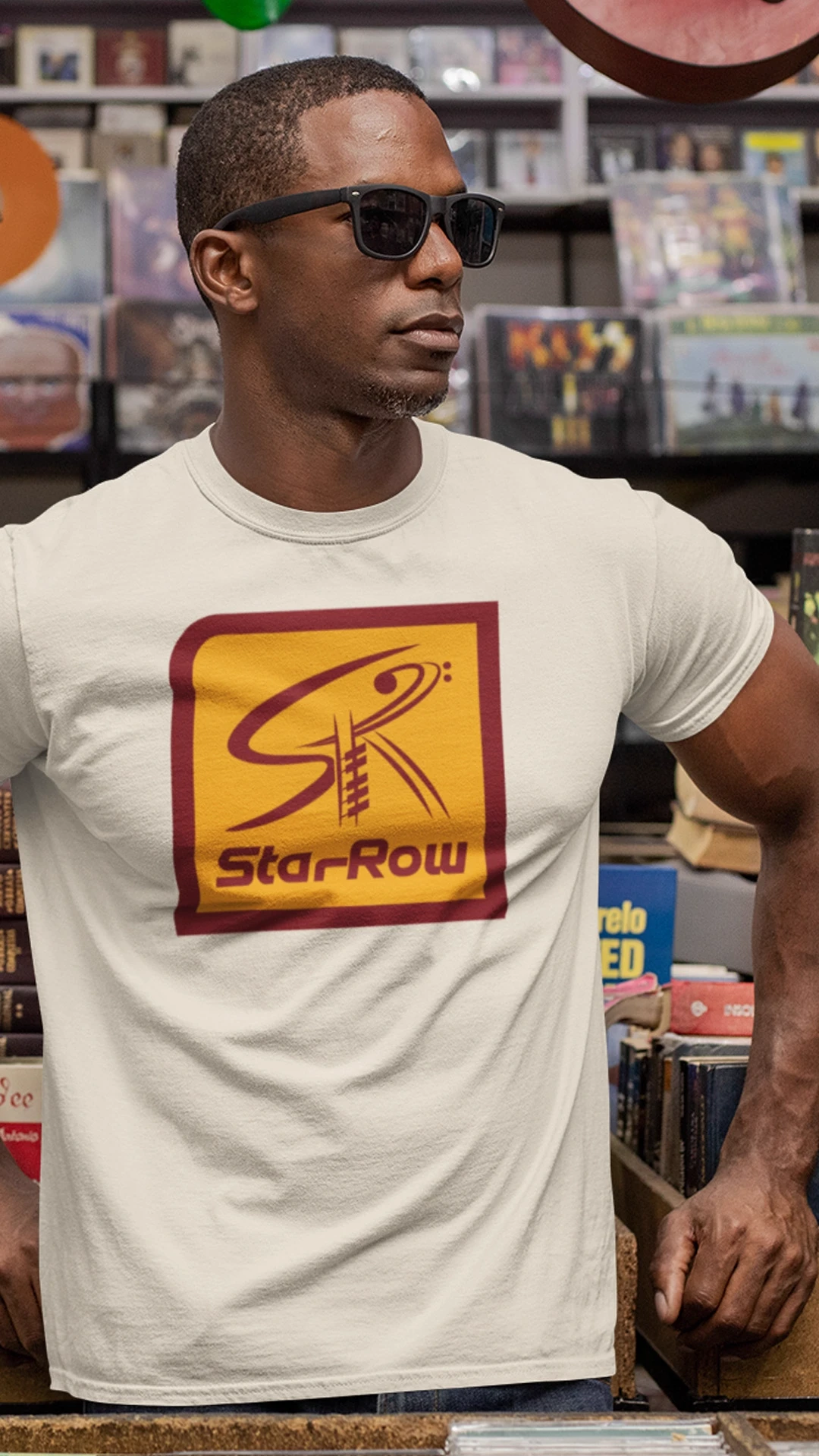 podcast-branding-starrow-merch-tshirt-design Man wearing a StarRow podcast logo T-shirt, an example of branded show merchandise