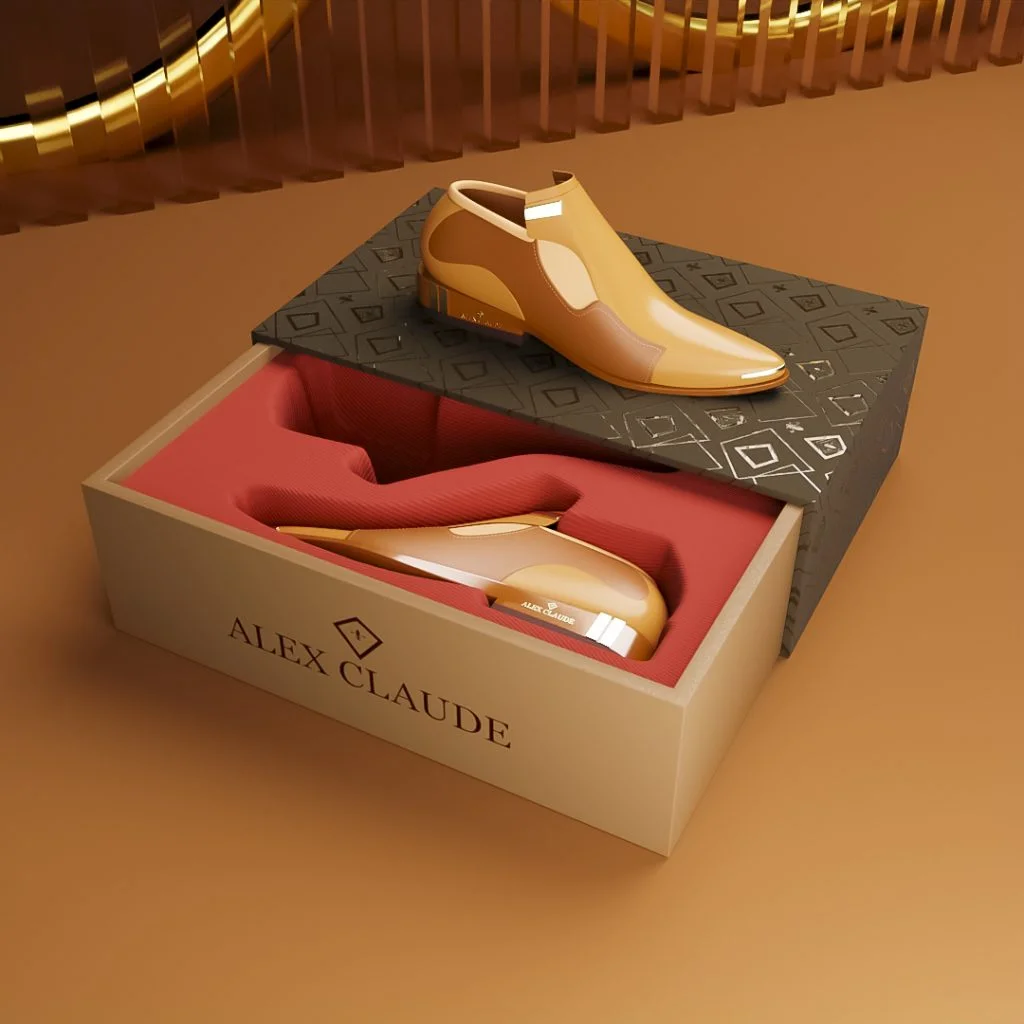 tan-leather-shoes-open-gift-box Pair of tan leather dress shoes displayed alongside an open branded shoe box