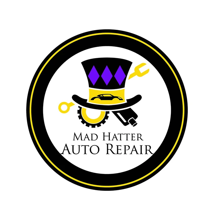 creative-services-mad-hatter-auto-repair-badge-logo Circular black and yellow Mad Hatter Auto Repair badge logo featuring a top hat icon.