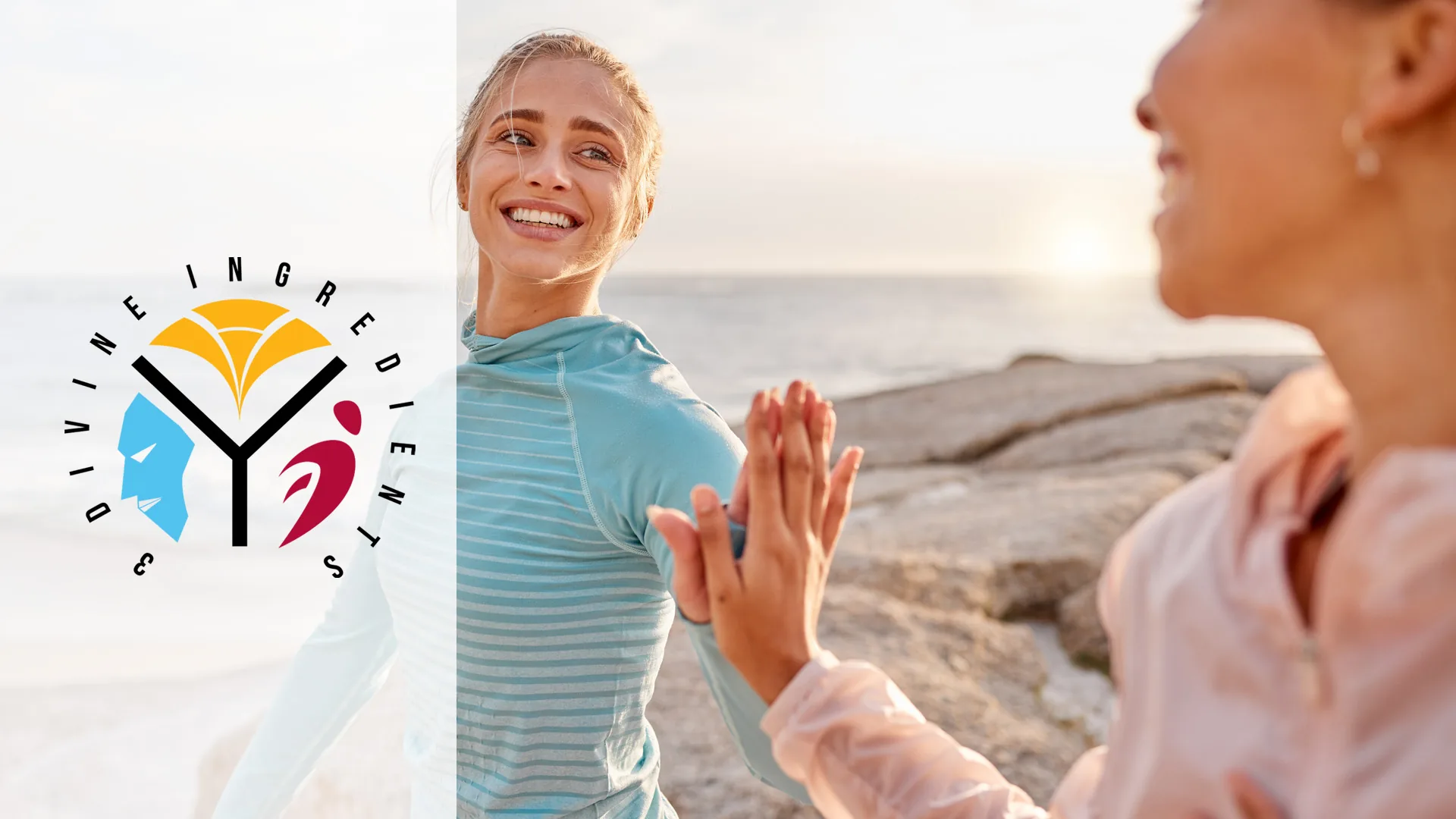 Divine Ingredients industry design women beach high five Two women in activewear giving each other a high five on a rocky beach.