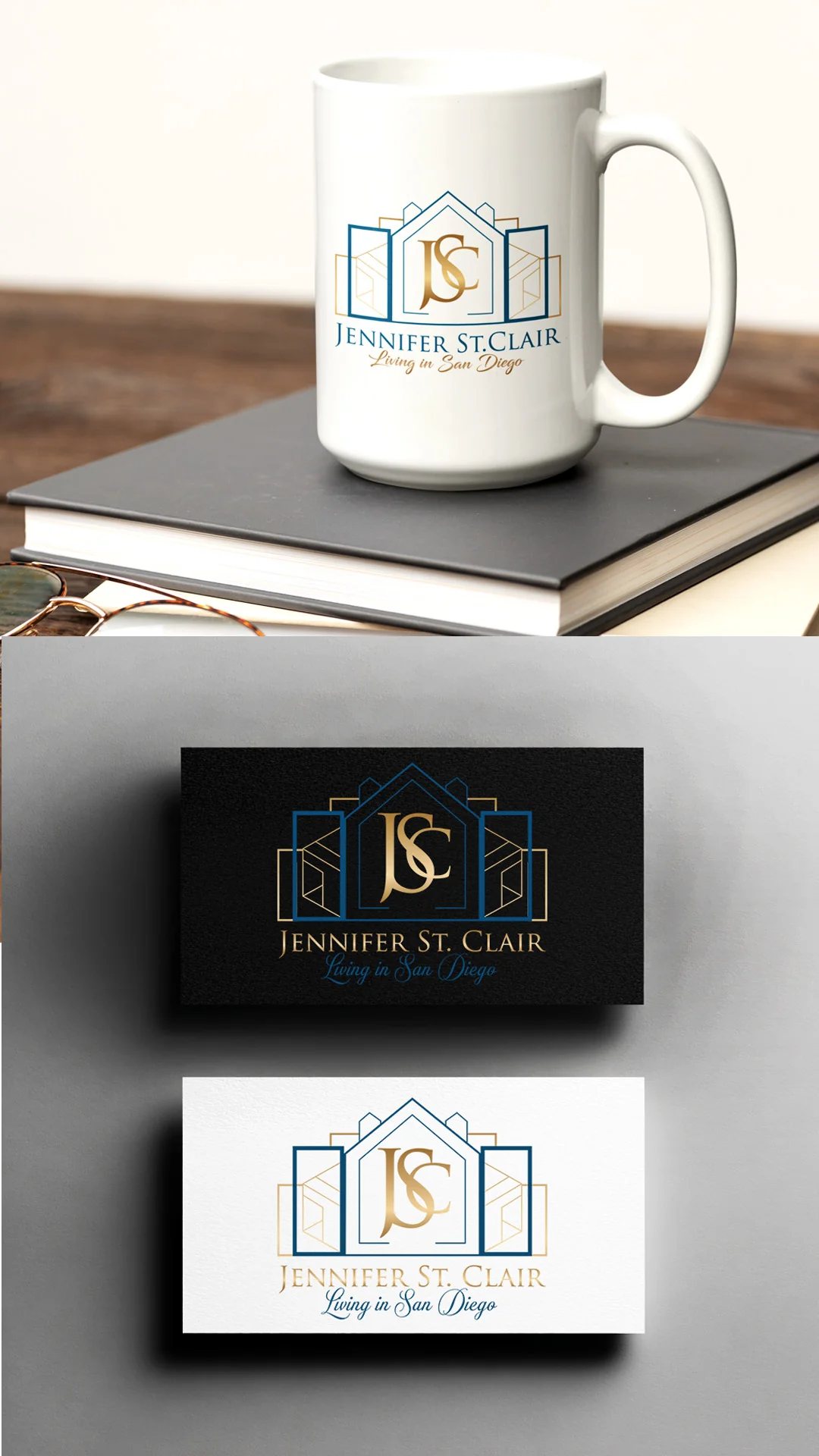 Jennifer St Clair Real Estate Logo Mug and Cards White ceramic mug on a book above black and white business cards with a gold and blue house logo.